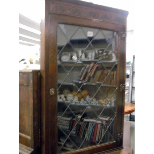 603 - A 20th century oak corner cabinet, COLLECT ONLY.