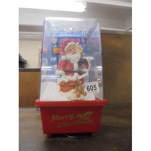 605 - A boxed illuminating Christmas snow storm Santa decoration