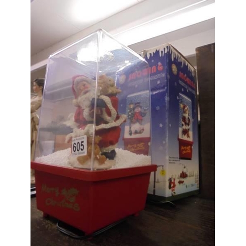 605 - A boxed illuminating Christmas snow storm Santa decoration