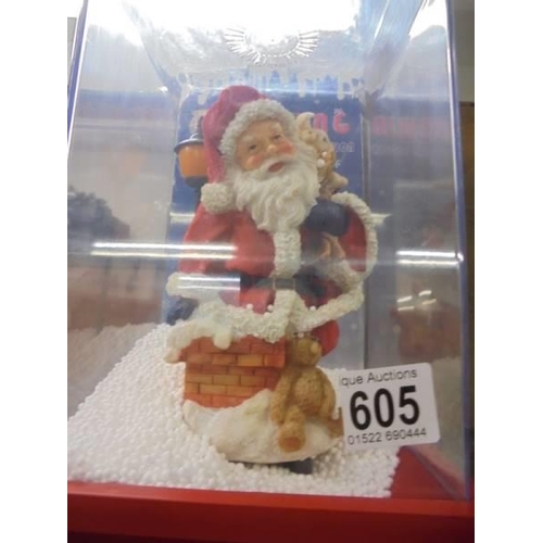 605 - A boxed illuminating Christmas snow storm Santa decoration