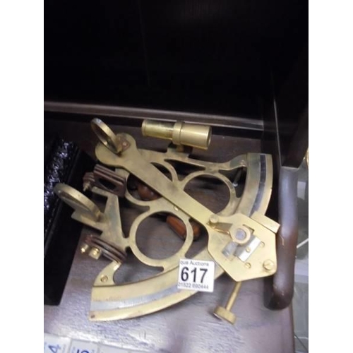 617 - A good 20th century copy of a brass sextant.