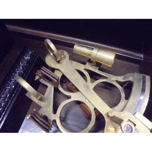 617 - A good 20th century copy of a brass sextant.