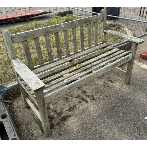 643 - A wooden garden bench