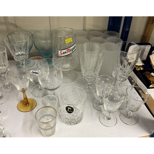 499 - A shelf of drinking glasses, An ice bucket & a jug