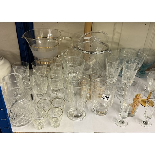 499 - A shelf of drinking glasses, An ice bucket & a jug