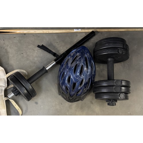 793 - A quantity of dumbbells, a cycle helmet & snooker cue