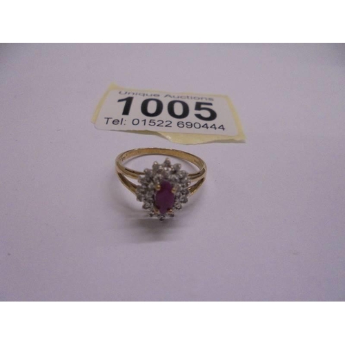 1005 - A yellow gold oval ruby and diamond ring, size L, 1.8 grams.