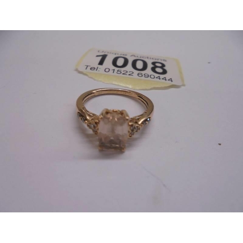 1008 - A 14ct yellow gold morganite and diamond ring, size M half, 2.7 grams.