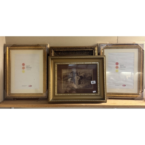 601 - 4 gilt picture frames of various sizes, 1 containing a sepia print of a girl with lion & farm animal... 