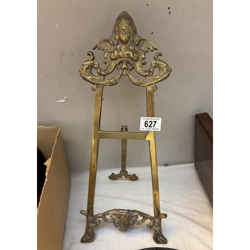 627 - A brass easel. Height approximately 47cm