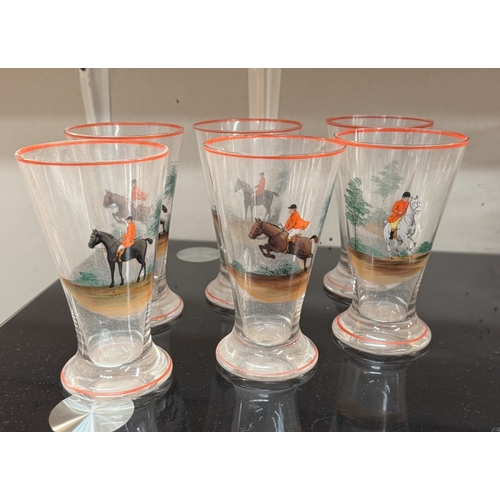 633 - A large vintage water jug & sets of glasses depicting hunting scenes