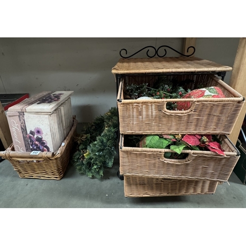 645 - A 3 drawer wicker basket on wheels, wicker basket, quantity of canvas of fruit, & a Christmas wreath... 