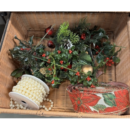 645 - A 3 drawer wicker basket on wheels, wicker basket, quantity of canvas of fruit, & a Christmas wreath... 