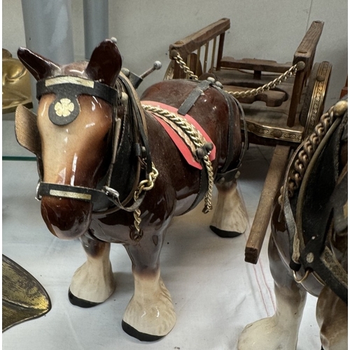 646 - 2 Ceramic shire horses with carts