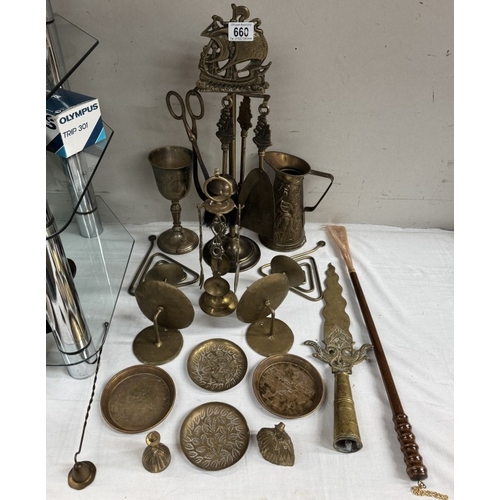 660 - A good selection of brassware including companion set, spear, finial etc