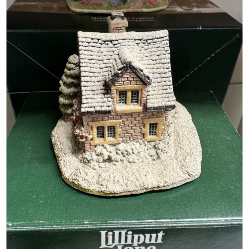 671 - A collection of Lilliput Lane cottages (6 boxed & 2 loose)