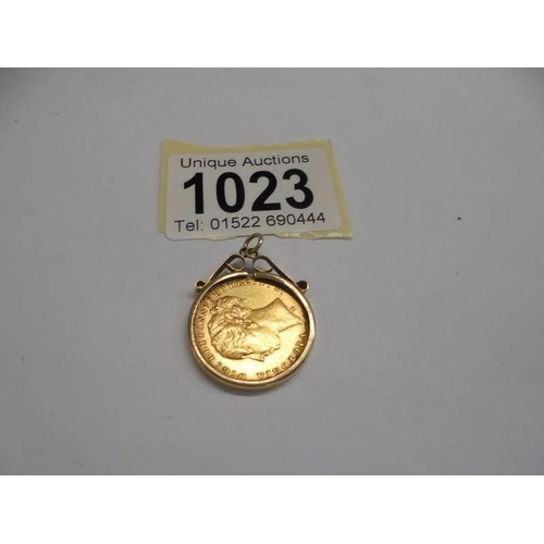 1023 - An 1878 Queen Victoria young head gold sovereign in a 9ct gold pendant mount.