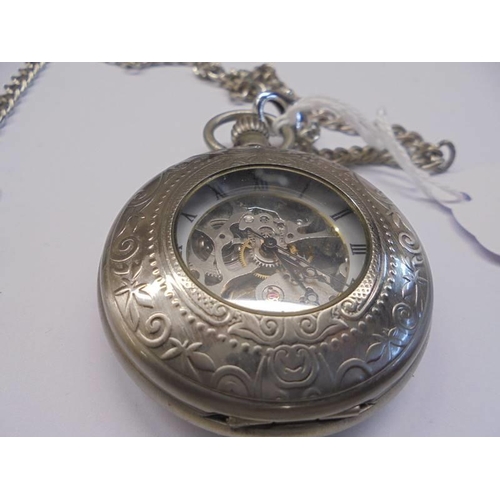 1027 - An open escapement pocket watch on chain, in working order.