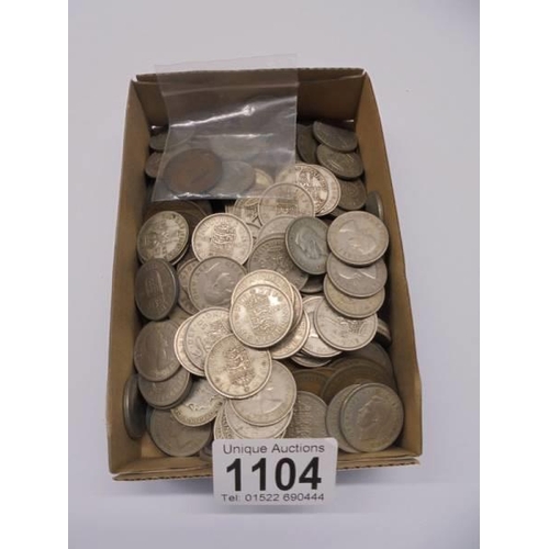 1104 - A large quantity of old pennies and one shilling coins.