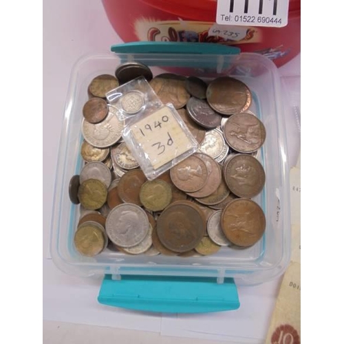 1111 - A quantity of coins and bank notes.