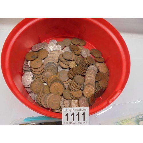 1111 - A quantity of coins and bank notes.