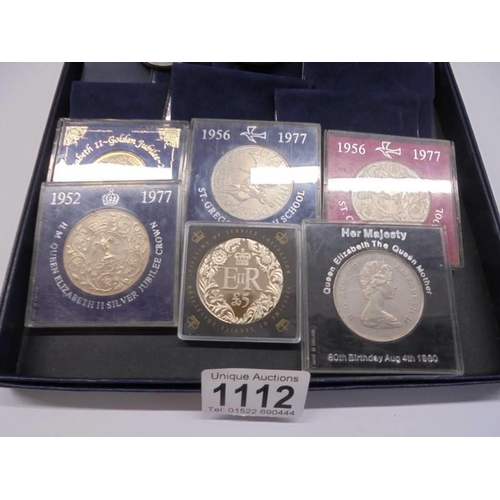 1112 - A collection of commemorative crown, 50 pence pieces etc.,