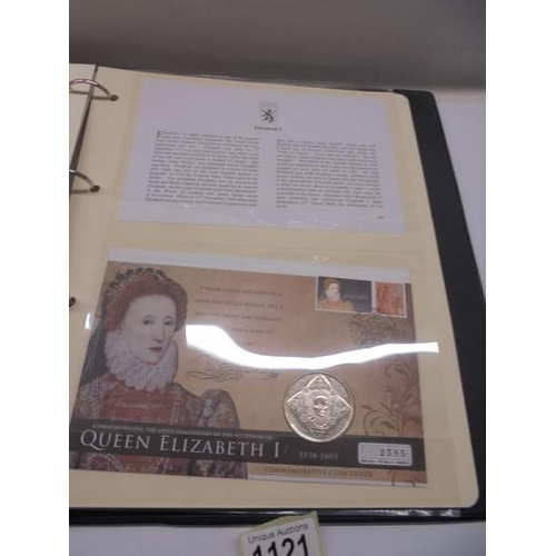 1121 - A Coins of the Realm folder with Queen Elizabeth II cover, D Day cover and replica newspaper.