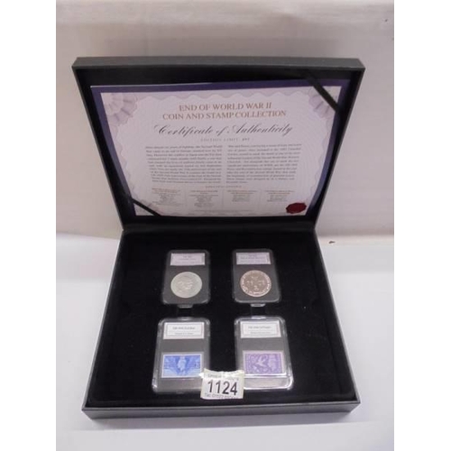 1124 - A cased 'End of WWII' coin and stamp collection.