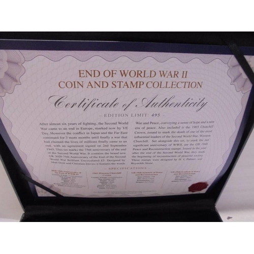 1124 - A cased 'End of WWII' coin and stamp collection.