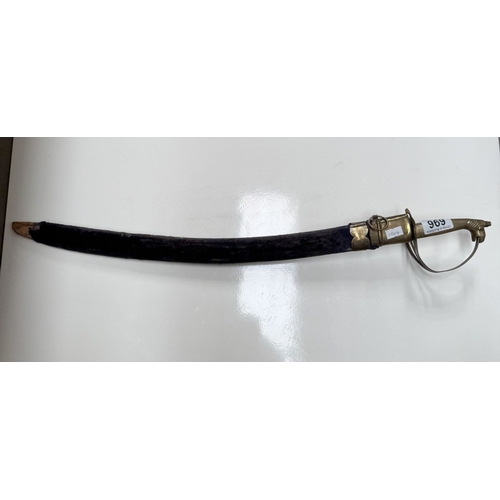 696 - An Indian made sword with brass fittings