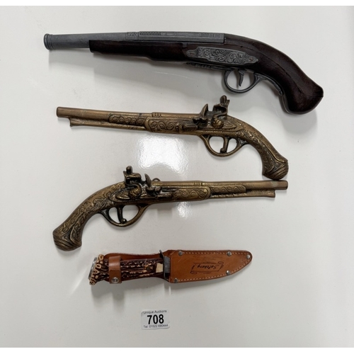 708 - A German Salzburg hunting knife, A pair of brass wall hangings & an artificial flintlock pistol