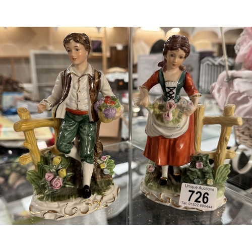 726 - A pair of vintage figurines (Boy & Girl with flowers)