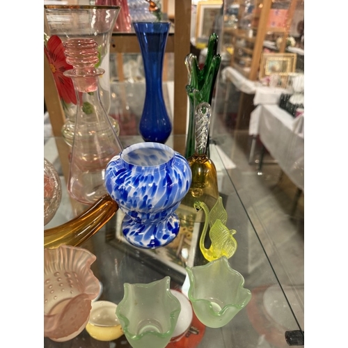 738 - A good selection of coloured art glass