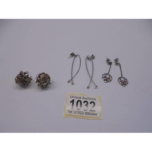 1032 - Three pairs of silver earrings.