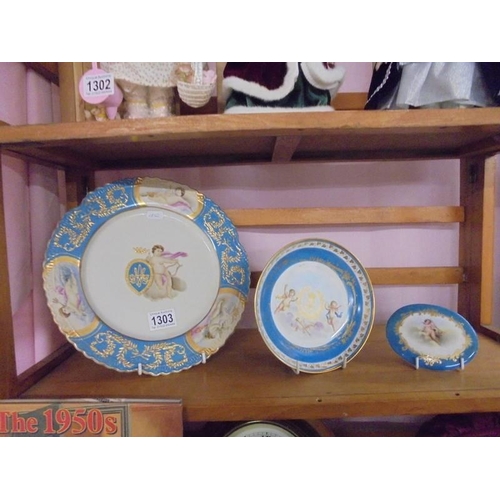 1303 - A continental porcelain hand painted cabinet plate, dish and plaque.