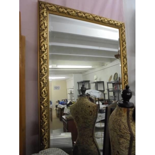 1313 - A large gilt framed wall mirror. COLLECT ONLY.