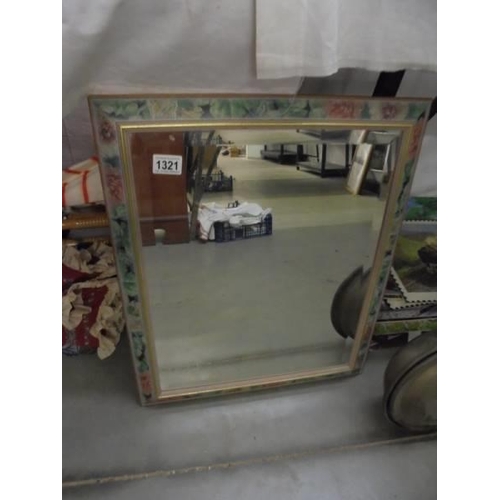 1321 - A floral framed wall mirror. COLLECT ONLY.