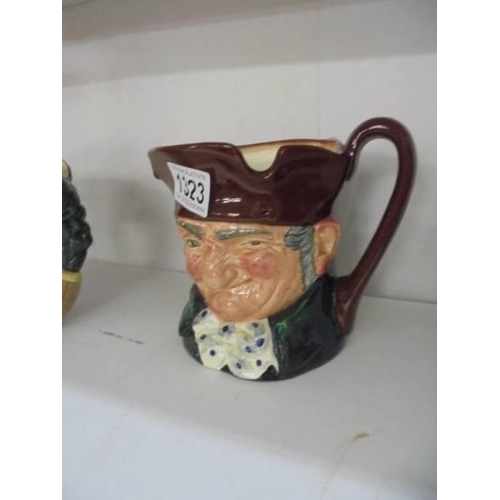 1323 - Two Royal Doulton character jugs and a Royal Doulton Toby jug.