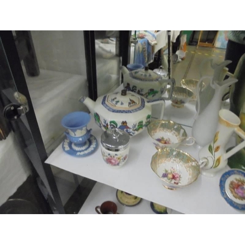 1340 - A mixed lot of ceramics including teapot, vases etc.,