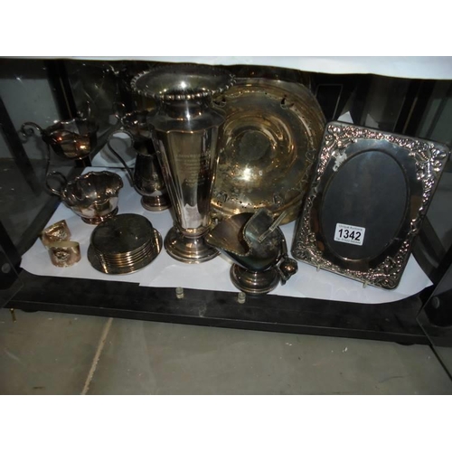 1342 - A mixed lot of silver plate including photo frame, vase etc.,