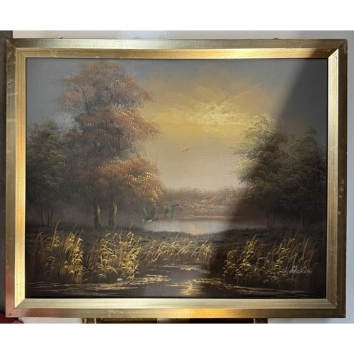 755 - A selection of gilt picture frames in various sizes including an oil on canvas of flying ducks