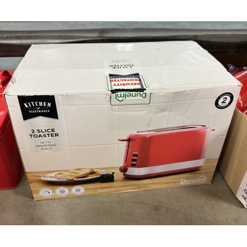 756 - A quantity of red kitchenware including Microwave, grill, toaster etc & A quantity of Nescafe items ... 