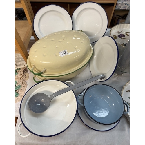 757 - A good selection of vintage enamel kitchen ware including a large cooking pot