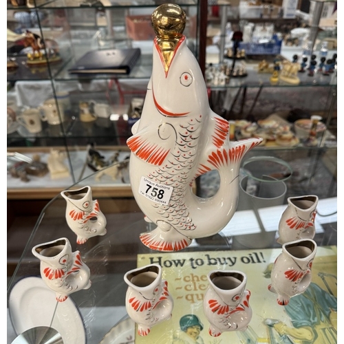 758 - A vintage ceramic fish decanter & 6 fish shaped shot glasses