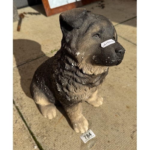 784 - A painted concrete puppy