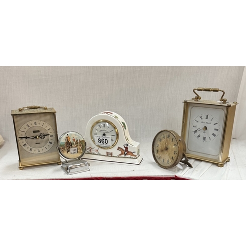 860 - A vintage perpetual calendar with hunting scene & a selection of clocks