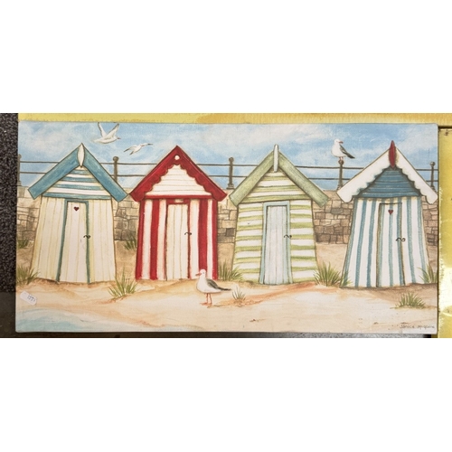 870 - 2 Prints on canvas of beach huts & 1 other