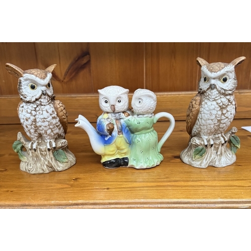 897 - A quantity of owl figures, an owl door stop, teapots etc