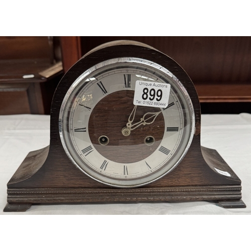 899 - An oak mantle clock