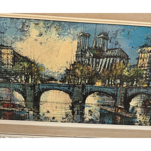 904 - A large oil on canvas of Paris by Rene Chanel, frame A/F 130 x 51cm